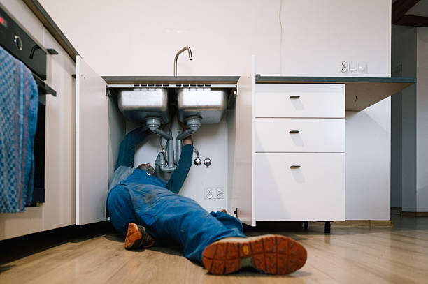 Professional Drain Cleaning technician working in Talladega, AL